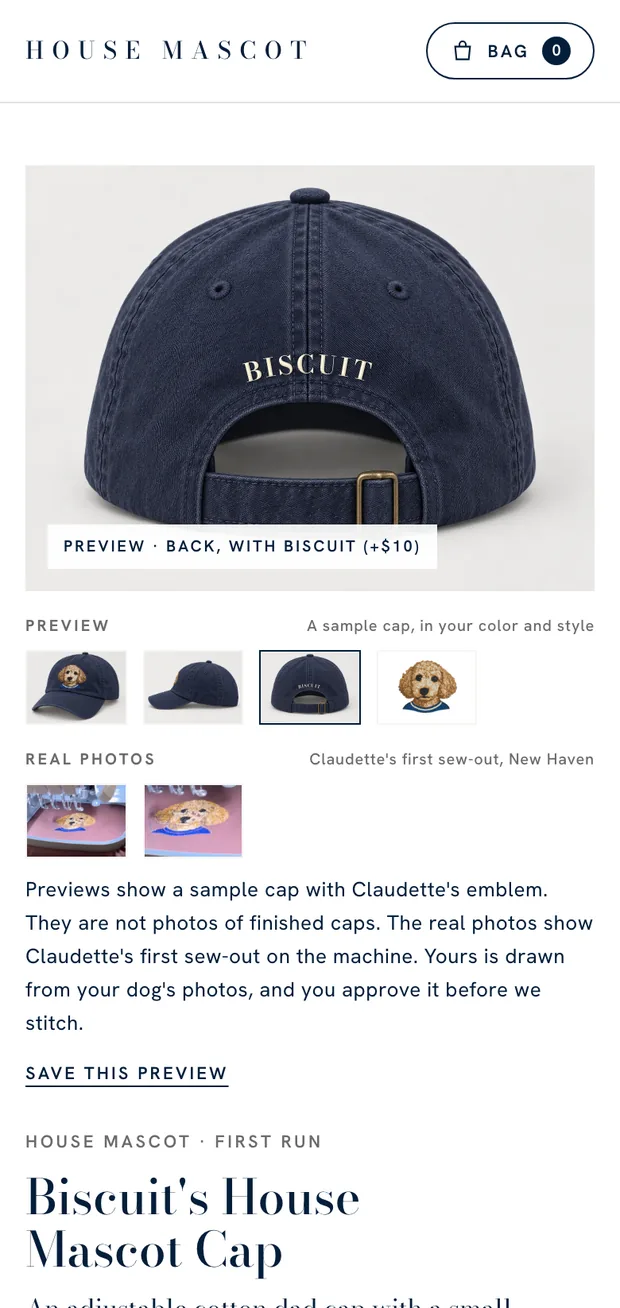 The cap builder on a phone, with Biscuit's name on the back of the cap